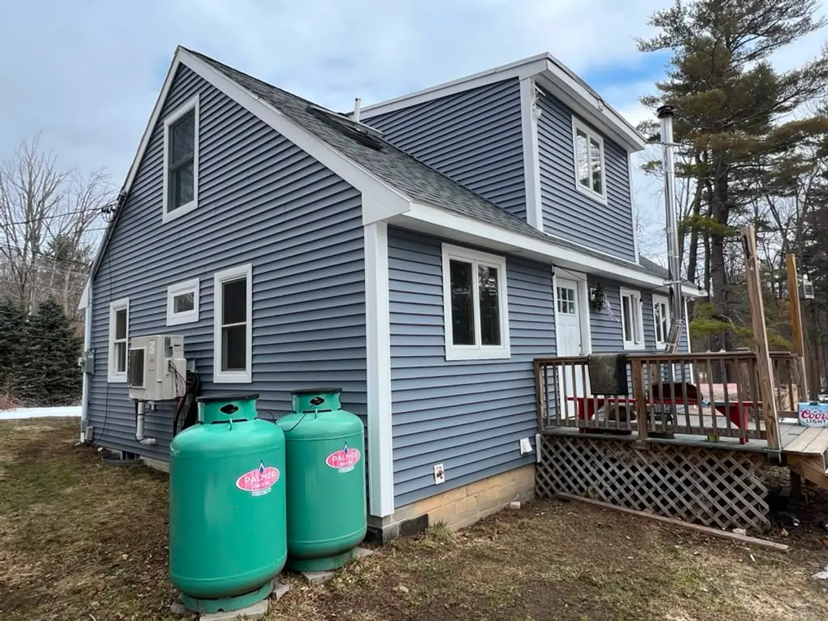 Whole-House Siding Replacement completed project in Atkinson, NH - After renovation by Maia Construction